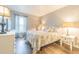 Bright bedroom featuring a comfortable bed and ample floor space at 1799 N Highland Ave # 26, Clearwater, FL 33755