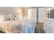 Spacious bedroom with a queen-size bed and built-in dresser at 1799 N Highland Ave # 26, Clearwater, FL 33755