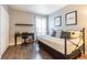 Cozy bedroom with a daybed, desk and neutral decor at 1799 N Highland Ave # 26, Clearwater, FL 33755