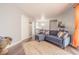 Relaxing living room featuring a comfortable sectional sofa and beachy decor at 1799 N Highland Ave # 26, Clearwater, FL 33755