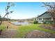 Scenic pond with gazebo and lush landscaping at 6011 Hammock Hill Ave, Lithia, FL 33547