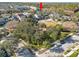 Aerial view showcasing a house's location near a park at 9713 Royce Dr, Tampa, FL 33626