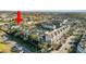 Aerial view of a condo building and surrounding neighborhood at 9713 Royce Dr, Tampa, FL 33626