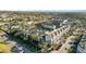 Aerial view of community featuring multi-story buildings and parking at 9713 Royce Dr, Tampa, FL 33626
