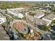 Aerial view of a vibrant community with town square and surrounding buildings at 9713 Royce Dr, Tampa, FL 33626