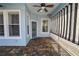 Covered patio with brick pavers and a striped awning creating a shaded retreat at 9713 Royce Dr, Tampa, FL 33626