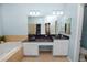 Bathroom with double vanity and granite countertop at 9713 Royce Dr, Tampa, FL 33626
