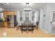 Bright dining room with hardwood floors and a large table at 9713 Royce Dr, Tampa, FL 33626