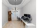 Bright home office features built-in desk, hardwood floors, and large windows at 9713 Royce Dr, Tampa, FL 33626