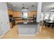 Modern kitchen with light wood cabinets, granite counters and stainless steel appliances at 9713 Royce Dr, Tampa, FL 33626