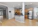 Modern kitchen with light wood cabinets, granite counters and stainless steel appliances at 9713 Royce Dr, Tampa, FL 33626