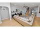 Spacious living room with hardwood floors and a sectional sofa at 9713 Royce Dr, Tampa, FL 33626