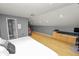 Main bedroom with ensuite bathroom and hardwood floors at 9713 Royce Dr, Tampa, FL 33626