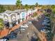 Aerial view of shopping center parking lot with various stores at 9713 Royce Dr, Tampa, FL 33626