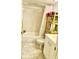 Clean bathroom with bathtub and shelving at 14900 Gulf Blvd # 113, Madeira Beach, FL 33708