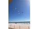 Beachfront property with kites in the air at 14900 Gulf Blvd # 113, Madeira Beach, FL 33708