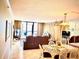 Combined living and dining area at 14900 Gulf Blvd # 113, Madeira Beach, FL 33708