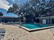 Community pool with plenty of deck space for sunbathing at 936 Virginia St # 208, Dunedin, FL 34698