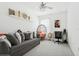 Relaxing bedroom with unique decor, featuring a cozy seating area and a dedicated workspace at 11658 Bluestone Ct, Parrish, FL 34219