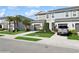 Inviting townhomes showcasing garages, landscaped front yards, and attractive exterior design at 11658 Bluestone Ct, Parrish, FL 34219