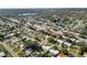 An aerial view of a neighborhood, featuring nearby lake at 2167 Timber Ln, Clearwater, FL 33763