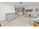 Inviting living room featuring plush carpet, neutral walls, and comfortable seating at 2167 Timber Ln, Clearwater, FL 33763