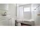 Bathroom with a vanity, toilet, and shower/tub combo and white tile at 2954 37Th N Ave, St Petersburg, FL 33713