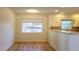 Bright dining area with hardwood floors, neutral walls, and natural light at 2954 37Th N Ave, St Petersburg, FL 33713