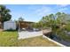 Waterfront property with new dock and boat lift with shed nearby at 3215 W Shell Point Rd, Ruskin, FL 33570