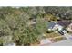 Aerial view of the residence, showcasing the landscaping, driveway, and the nearby street at 530 Napa Valley Cir, Valrico, FL 33594