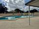 The community pool is a great place to relax and unwind on a hot day at 11231 Dollar Lake Dr # 1, Port Richey, FL 34668