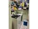 Laundry room with full size appliances and wire shelving at 11231 Dollar Lake Dr # 1, Port Richey, FL 34668