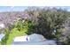 Aerial view highlighting the backyard and roof at 1413 May St, Lutz, FL 33548