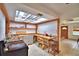 Bright kitchen with stainless steel appliances, butcher block countertop, and an abundance of natural light at 1413 May St, Lutz, FL 33548