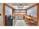 Well-lit kitchen featuring stainless steel appliances, butcher block countertops and skylight at 1413 May St, Lutz, FL 33548