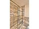 Shower featuring a sliding glass door and marble tile walls at 1413 May St, Lutz, FL 33548