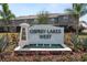 Community sign with a fountain featuring the 'Osprey Lakes West' name at 8680 Falling Blue Pl, Riverview, FL 33578