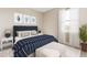 Spacious bedroom with a navy and white bedding set at 9054 Calumet Blvd, Port Charlotte, FL 33981