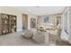 Relaxing living room featuring neutral tones and built-in shelving at 9054 Calumet Blvd, Port Charlotte, FL 33981