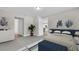 Main bedroom with a king-size bed and plenty of natural light at 1970 Blackwood Cir, North Port, FL 34286