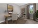 Home office with built-in shelving and window at 1970 Blackwood Cir, North Port, FL 34286