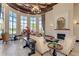 Elegant clubhouse lounge with comfortable seating and fireplace at 20625 Romagna Pl, Venice, FL 34293
