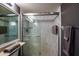 Shower with marble tile and built-in seat at 266 Cerromar S Way # 55, Venice, FL 34293