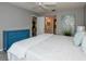 Main bedroom with ensuite bathroom and dresser at 266 Cerromar S Way # 55, Venice, FL 34293