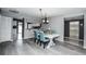 Open concept dining area with kitchen view at 266 Cerromar S Way # 55, Venice, FL 34293