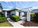 Covered patio with table and chairs at 266 Cerromar S Way # 55, Venice, FL 34293
