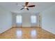 Bright and airy bedroom with parquet floors and large windows at 1061 Owl Dr, Englewood, FL 34223