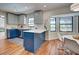 Bright kitchen with modern appliances, an adjacent dining nook, and natural light at 1061 Owl Dr, Englewood, FL 34223