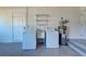 Laundry Area featuring washer, dryer, and laundry sink in garage at 1061 Owl Dr, Englewood, FL 34223