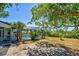 Screened in pool with sunny backyard at 1061 Owl Dr, Englewood, FL 34223